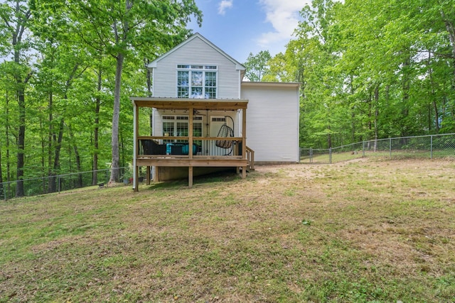 1005 Lauren Cir, Burns, TN 37029 - back of property with a lawn, a fenced backyard, and a deck