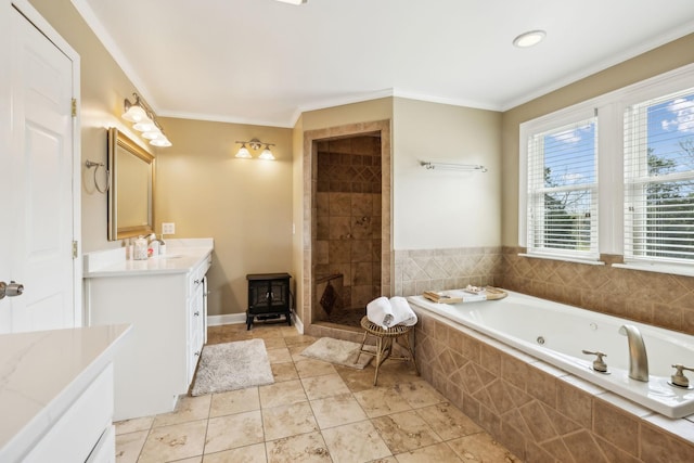 921 Cooks Rd, Mount Juliet, TN 37122 - bathroom with a wood stove, vanity, a jetted tub, a shower stall, and ornamental molding