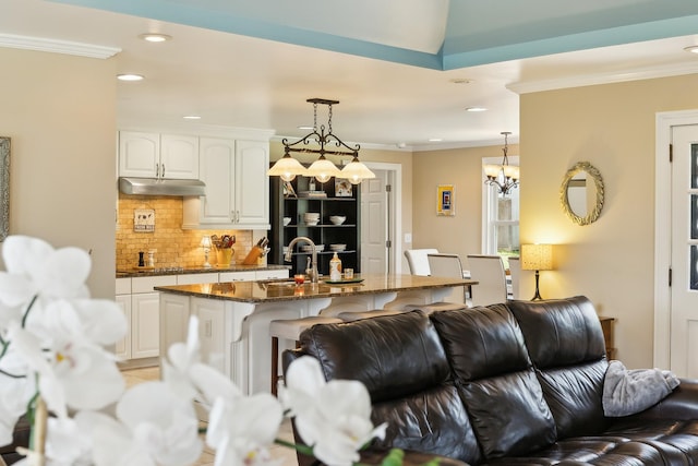 921 Cooks Rd, Mount Juliet, TN 37122 - living area with recessed lighting, ornamental molding, and a chandelier