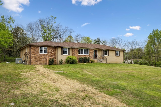 921 Cooks Rd, Mount Juliet, TN 37122 - back of house featuring a lawn and central AC