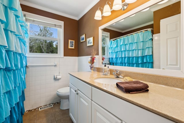 921 Cooks Rd, Mount Juliet, TN 37122 - bathroom with crown molding, tile walls, tile patterned flooring, vanity, and toilet