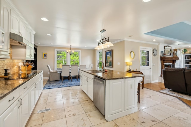 921 Cooks Rd, Mount Juliet, TN 37122 - kitchen with stainless steel dishwasher, decorative backsplash, baseboards, recessed lighting, and a sink