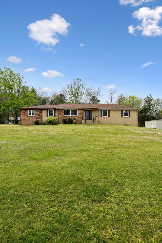 921 Cooks Rd, Mount Juliet, TN 37122 - view of front of house featuring a front lawn and brick siding