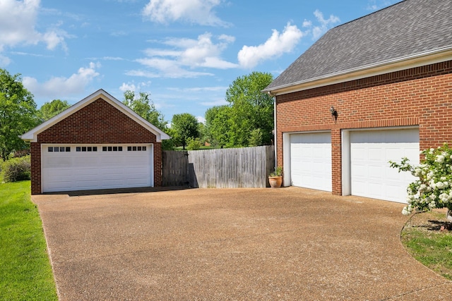 detached garage with fence
