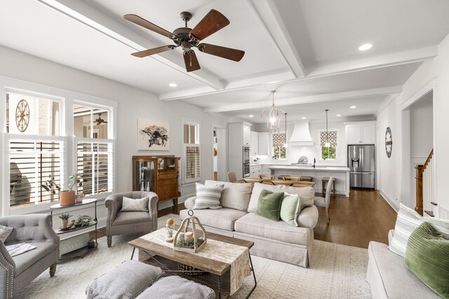 living area featuring recessed lighting, ceiling fan, beamed ceiling, and dark wood-style flooring