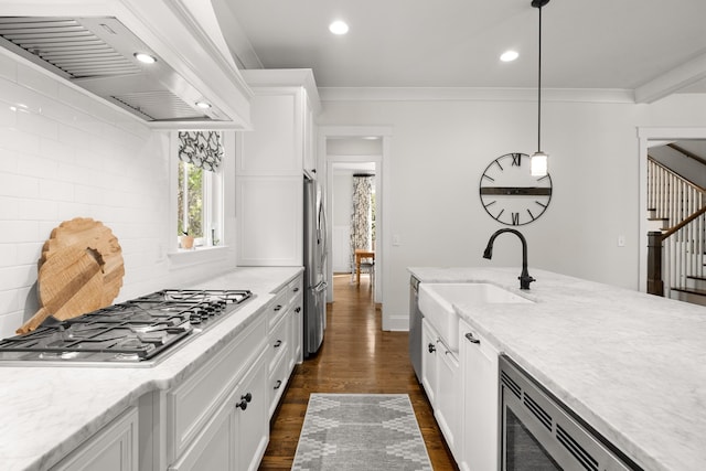 kitchen featuring premium range hood, white cabinets, stainless steel appliances, recessed lighting, and dark wood-type flooring