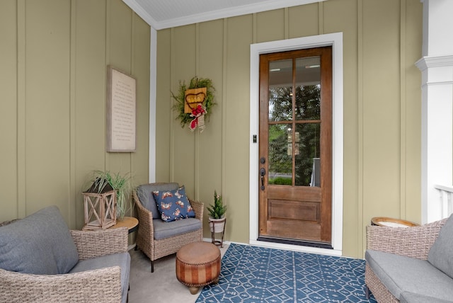 doorway to property with board and batten siding