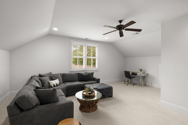 living area featuring a ceiling fan, baseboards, vaulted ceiling, and visible vents