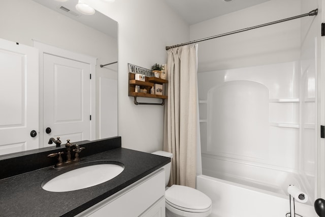 bathroom with vanity, shower / bath combo with shower curtain, toilet, and visible vents