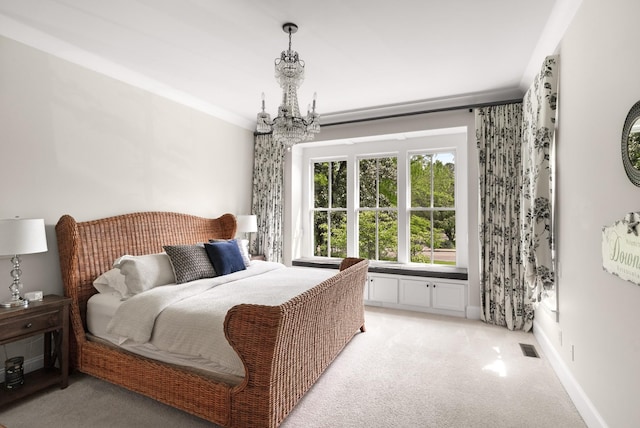 bedroom featuring light colored carpet, baseboards, a chandelier, and visible vents