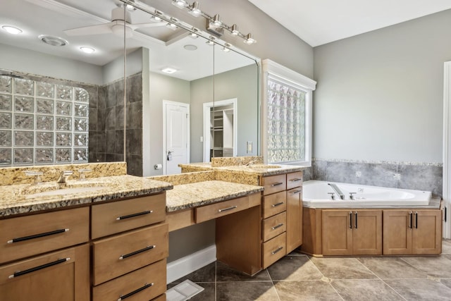 full bath featuring vanity, tile patterned flooring, a garden tub, and ceiling fan