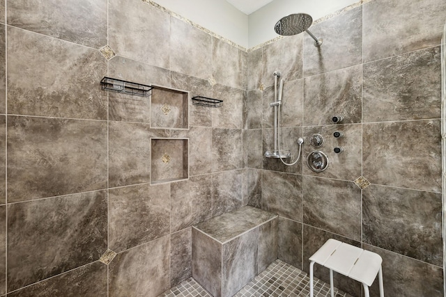 bathroom featuring tiled shower