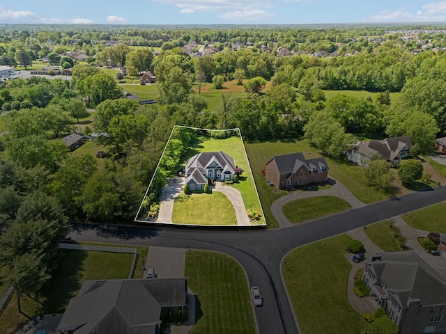 aerial view with a residential view and a forest view