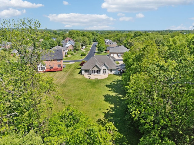 bird's eye view featuring a forest view