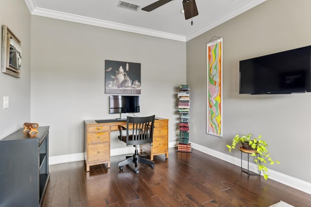 office space featuring visible vents, a ceiling fan, baseboards, and crown molding