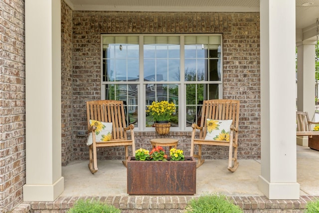 view of patio featuring a porch
