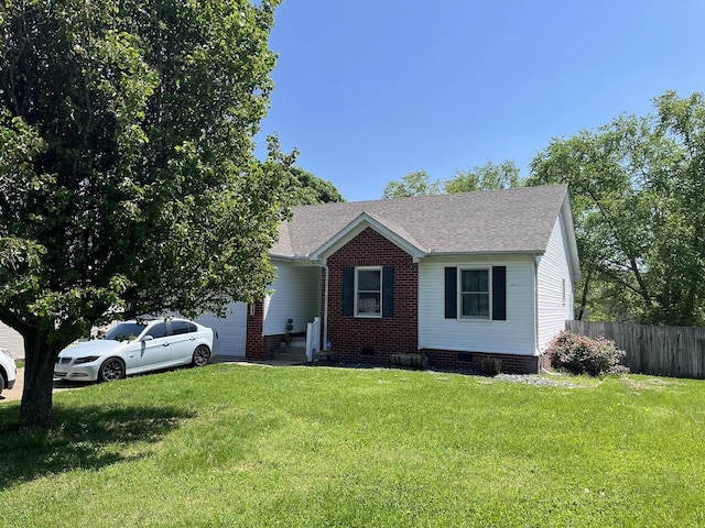 view of front of house featuring fence, a shingled roof, a front lawn, a garage, and crawl space