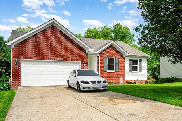 1904 Portway Rd, Spring Hill, TN 37174 - view of front facade with brick siding, driveway, a shingled roof, a front lawn, and a garage