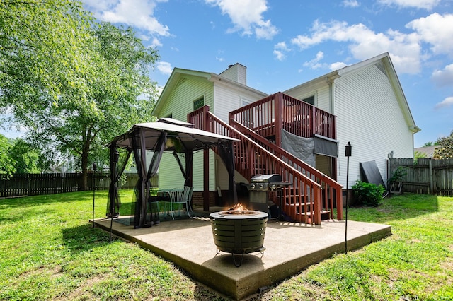 1904 Portway Rd, Spring Hill, TN 37174 - back of property featuring a patio, a fire pit, a gazebo, stairs, and a wooden deck