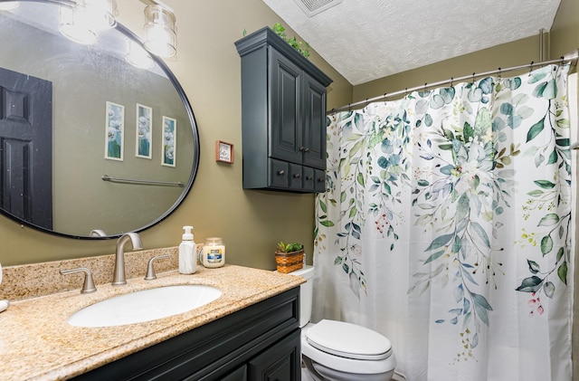 1904 Portway Rd, Spring Hill, TN 37174 - bathroom featuring a textured ceiling, toilet, vanity, and a shower with shower curtain
