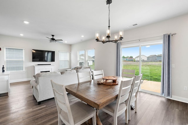 dining space featuring recessed lighting, baseboards, dark wood-style flooring, and visible vents