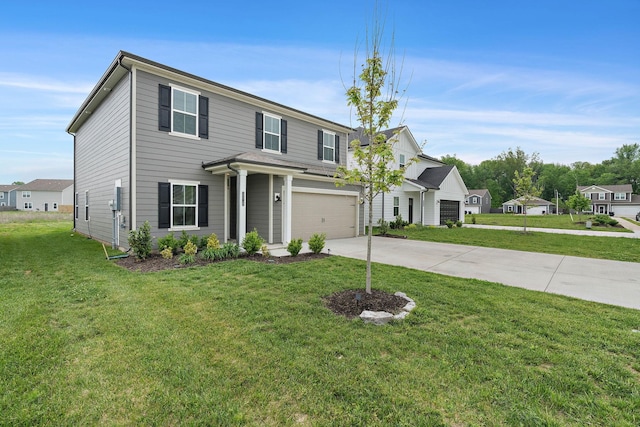 traditional home featuring a garage, driveway, and a front yard