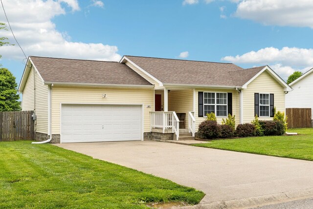 817 Stableford Rd, Oak Grove, KY 42262 - single story home with fence, driveway, roof with shingles, and a garage