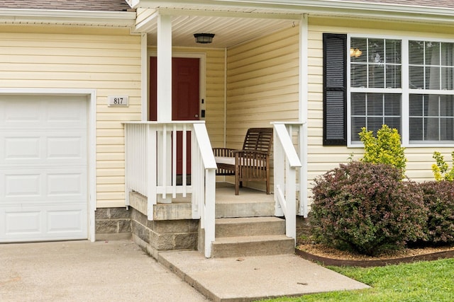817 Stableford Rd, Oak Grove, KY 42262 - view of exterior entry featuring roof with shingles, covered porch, and driveway