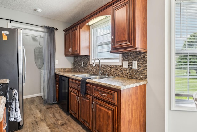817 Stableford Rd, Oak Grove, KY 42262 - kitchen featuring backsplash, dark wood-style floors, a sink, and black appliances