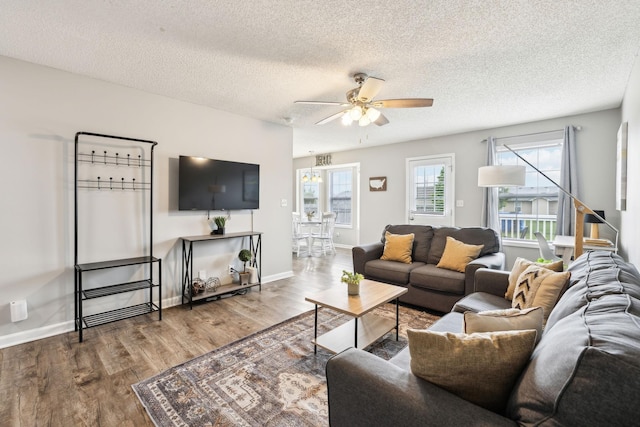 817 Stableford Rd, Oak Grove, KY 42262 - living room with a textured ceiling, ceiling fan, and wood finished floors