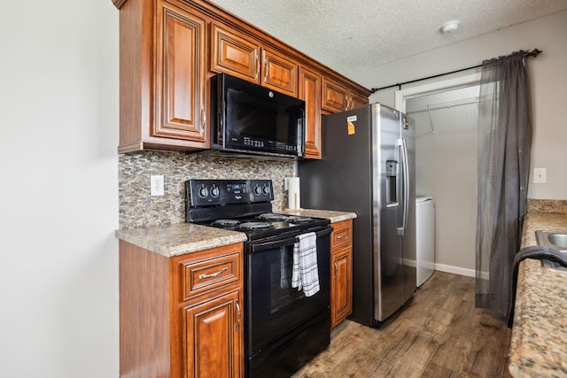 817 Stableford Rd, Oak Grove, KY 42262 - kitchen featuring light countertops, wood finished floors, and black appliances