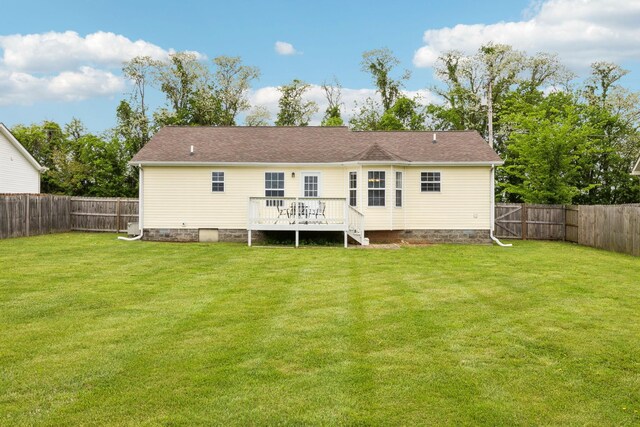 817 Stableford Rd, Oak Grove, KY 42262 - back of property with a lawn, crawl space, a wooden deck, and a fenced backyard