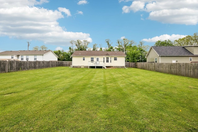817 Stableford Rd, Oak Grove, KY 42262 - back of house with a lawn, a fenced backyard, and a wooden deck