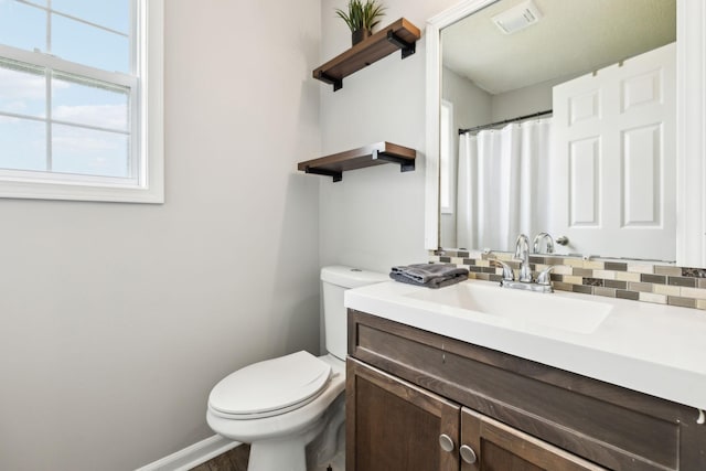 817 Stableford Rd, Oak Grove, KY 42262 - bathroom with vanity, baseboards, toilet, and visible vents
