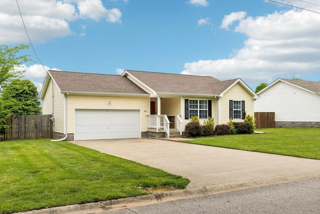 817 Stableford Rd, Oak Grove, KY 42262 - single story home featuring a garage, a front lawn, fence, roof with shingles, and concrete driveway
