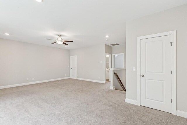 7205 Lake Rd, Fairview, TN 37062 - spare room featuring light colored carpet, recessed lighting, a ceiling fan, and baseboards