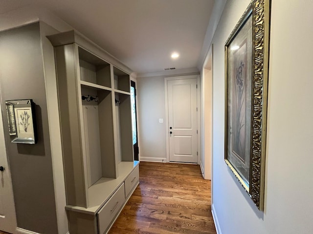 mudroom with recessed lighting, dark wood-style flooring, baseboards, and visible vents
