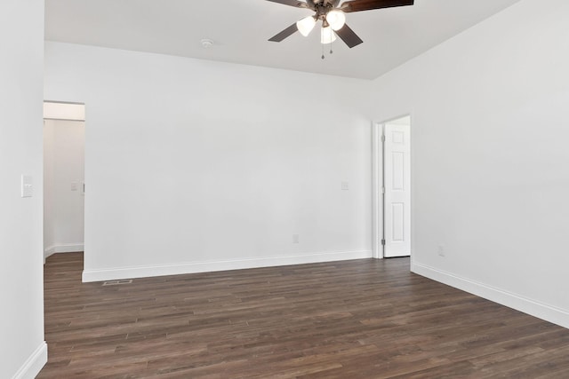 795 Lowery Ln, Mcminnville, TN 37110 - empty room featuring baseboards, ceiling fan, and dark wood-type flooring
