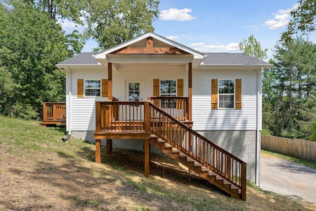 795 Lowery Ln, Mcminnville, TN 37110 - rear view of property featuring stairs, a shingled roof, a wooden deck, and fence