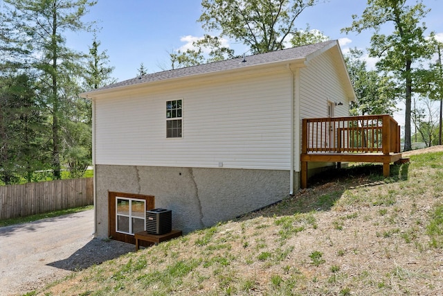 795 Lowery Ln, Mcminnville, TN 37110 - view of side of property featuring central AC unit, fence, and a wooden deck