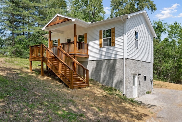 795 Lowery Ln, Mcminnville, TN 37110 - rear view of house with stairway and a wooden deck