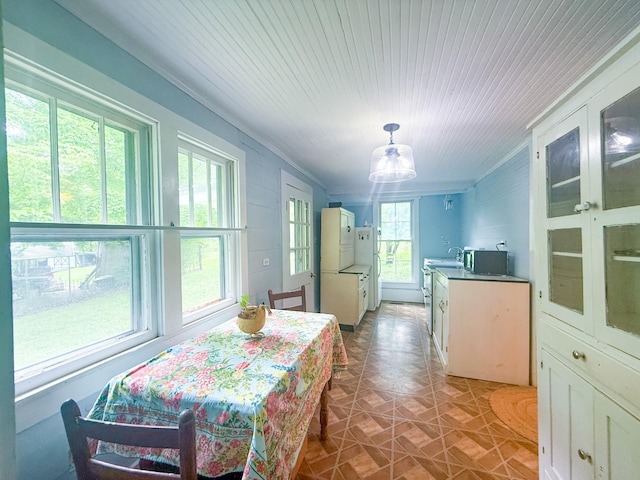 dining area with wooden ceiling
