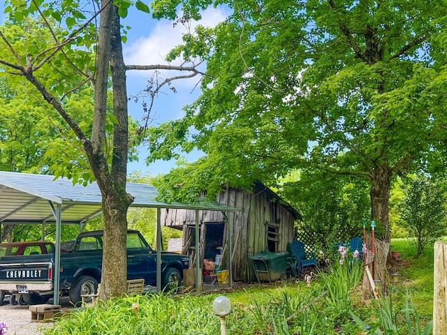 view of outdoor structure with a carport