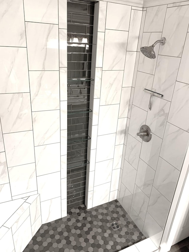 bathroom featuring a shower stall