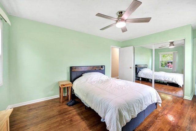 401 Longview St, Athens, AL 35611 - bedroom featuring baseboards, ceiling fan, a closet, and wood finished floors