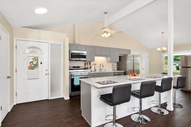 401 Longview St, Athens, AL 35611 - kitchen featuring beam ceiling, gray cabinetry, light countertops, a sink, and stainless steel appliances