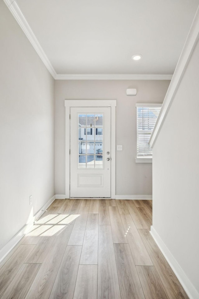 1010 Baltusrol Ln, Lebanon, TN 37087 - entrance foyer with baseboards, ornamental molding, a healthy amount of sunlight, and wood finished floors