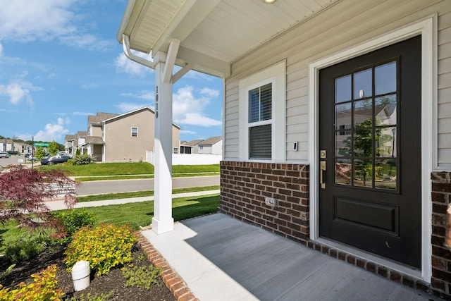 1010 Baltusrol Ln, Lebanon, TN 37087 - property entrance with covered porch, brick siding, and a residential view