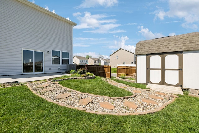 1010 Baltusrol Ln, Lebanon, TN 37087 - view of yard with an outdoor structure, fence, a storage unit, a patio area, and a residential view