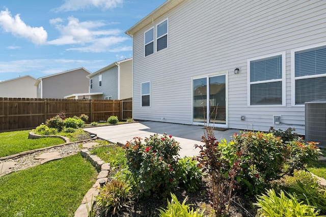 1010 Baltusrol Ln, Lebanon, TN 37087 - rear view of house featuring central air condition unit, a patio, and fence